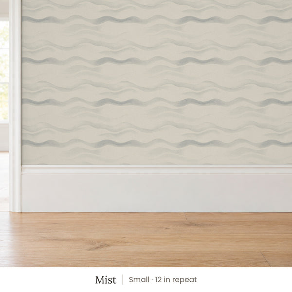 Lyme Mist peel and stick wallpaper, small 12 in repeat, above a white baseboard and oak floor