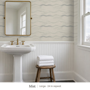 Lyme Mist peel and stick wallpaper, large 24 in repeat, in a bathroom with a pedestal sink and white beadboard