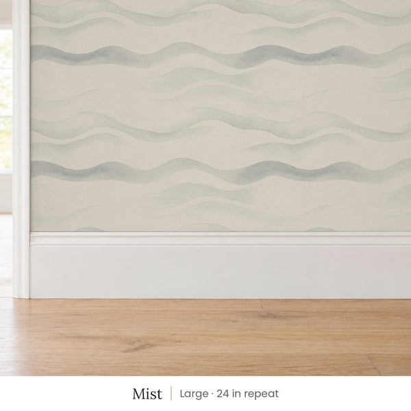 Lyme Mist peel and stick wallpaper, large 24 in repeat, above a white baseboard and oak floor