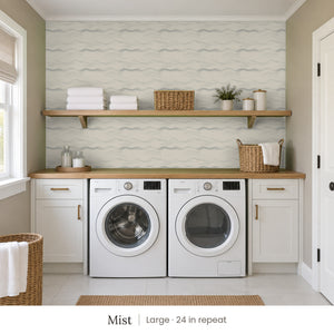 Lyme Mist peel and stick wallpaper, large 24 in repeat, in a laundry room with white cabinets and open shelves