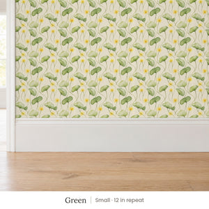 Zelda Green peel and stick wallpaper, small 12 in repeat, above a white baseboard and oak floor