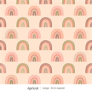 Over the Rainbow wallpaper in Apricot, large 24 in repeat, pink, coral and olive rainbows on peach