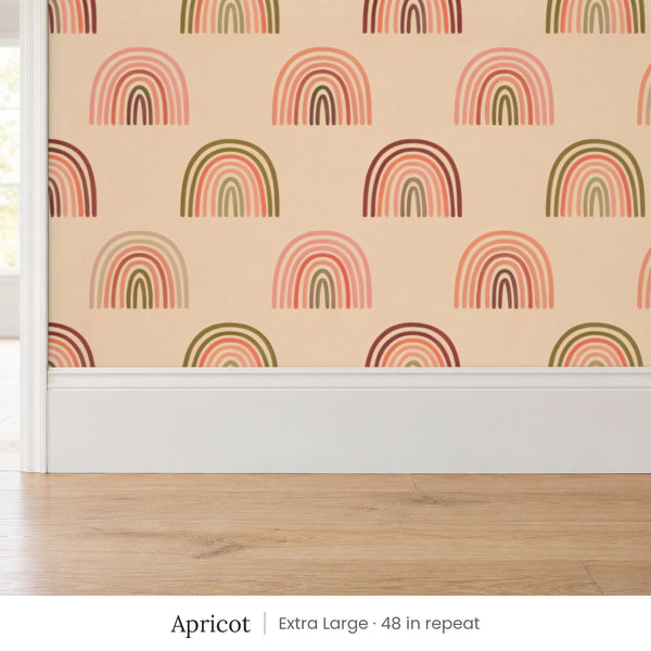 Over the Rainbow Apricot peel and stick wallpaper, extra large 48 in repeat, above a white baseboard and oak floor