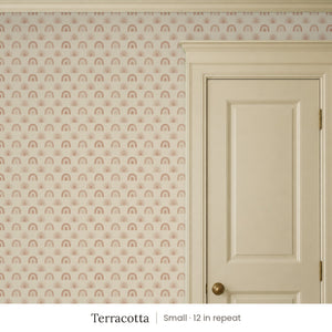 Over the Rainbow Terracotta peel and stick wallpaper, small 12 in repeat, beside a cream panel door