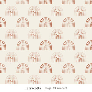 Over the Rainbow wallpaper in Terracotta, large 24 in repeat, soft terracotta and blush rainbows on cream