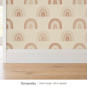 Over the Rainbow Terracotta peel and stick wallpaper, extra large 48 in repeat, above a white baseboard and oak floor