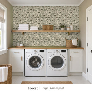 Sadie Forest peel and stick wallpaper, large 24 in repeat, in a laundry room with white cabinets and open shelves