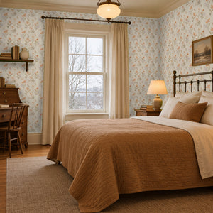 Pippa Clay peel and stick wallpaper in a bedroom with an iron bed and a writing desk