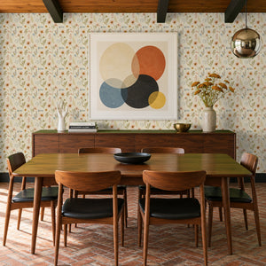 Nell Cream peel and stick wallpaper in a dining room with a walnut table and modern art