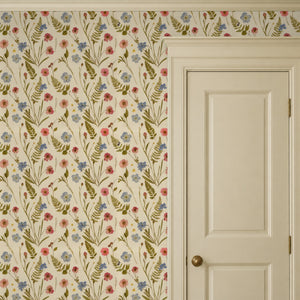 Cecily Meadow peel and stick wallpaper beside a cream panel door