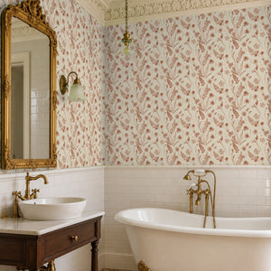 Cecily Terracotta peel and stick wallpaper in a bathroom with a gilded mirror and a vessel sink