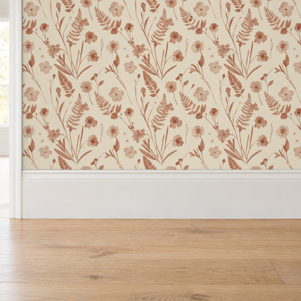 Cecily Terracotta peel and stick wallpaper above a white baseboard and oak floor