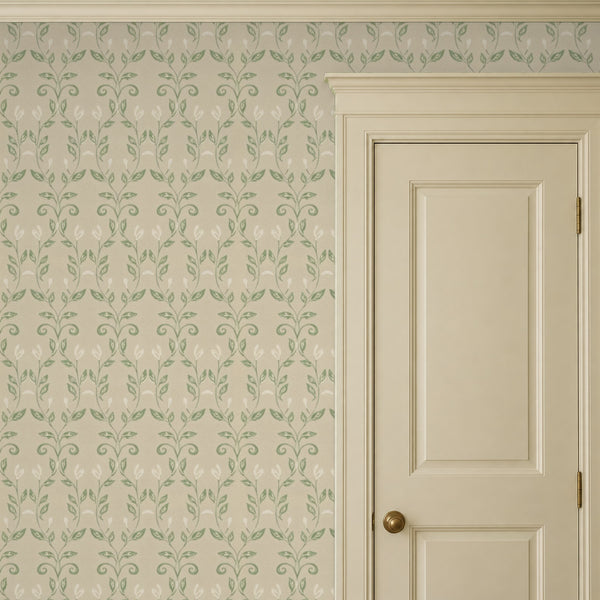 Quince Sage peel and stick wallpaper beside a cream panel door
