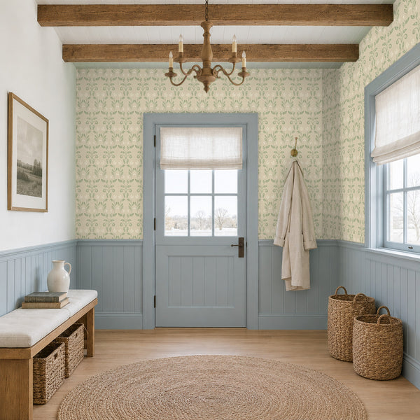 Quince Sage peel and stick wallpaper in a mudroom with a blue door and a bench