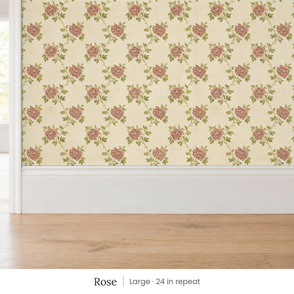 Tamsin Rose peel and stick wallpaper, large 24 in repeat, above a white baseboard and oak floor