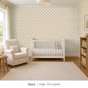 Tamsin Dove peel and stick wallpaper, large 24 in repeat, in a nursery with a white crib and an armchair