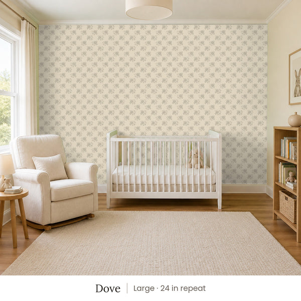 Tamsin Dove peel and stick wallpaper, large 24 in repeat, in a nursery with a white crib and an armchair