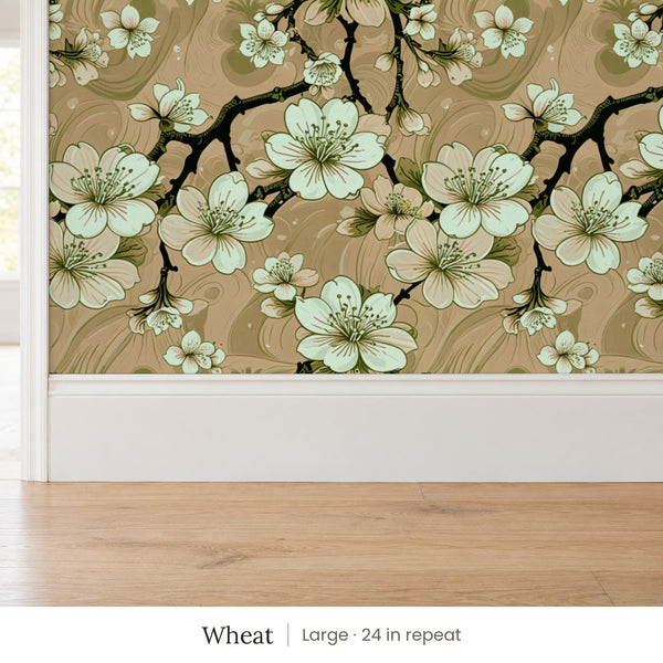 Sakura Wheat peel and stick wallpaper, large 24 in repeat, above a white baseboard and oak floor