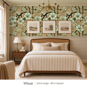 Sakura Wheat peel and stick wallpaper, extra large 48 in repeat, in a bedroom with shiplap paneling and framed landscape prints