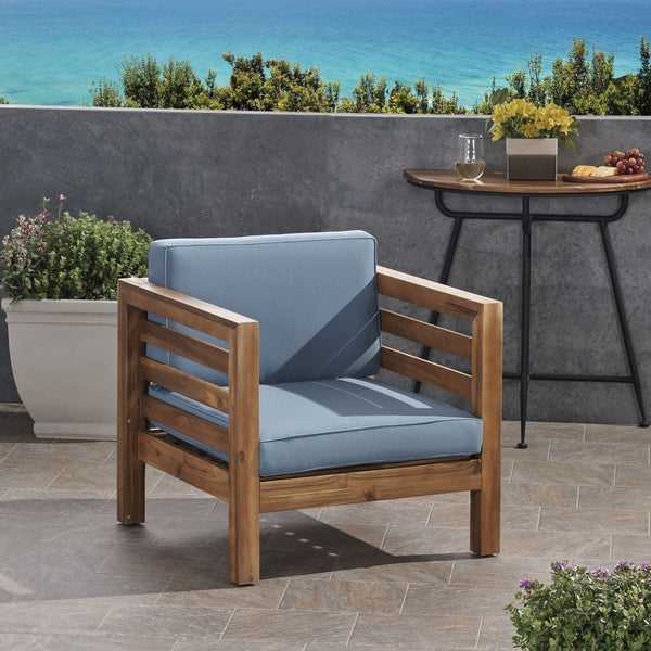 Outdoor Acacia Wood Patio Chair With Fabric Cushion - in use