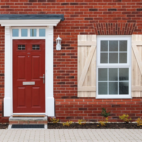 Wood Shutters on a red brick home