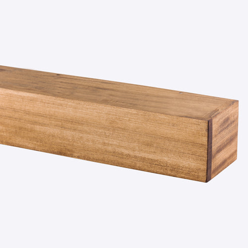 A rustic medium-brown wooden floating shelf displays a smooth finish and natural wood grain against a clean white background.